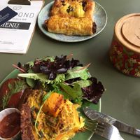 Deli items: quiche, Korean bbq burger, spinach & vegan feta roll, vegan sausage roll at Vegabond - Leliegracht in Amsterdam