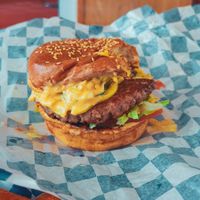West Coast (burger). Plant-based beef patty, thousand island, cheddar cheeze, tomato, pickles, onions & lettuce. Minus a chew. 169 nok. [22.04.2026] at Dirty V - Torggata in Oslo
