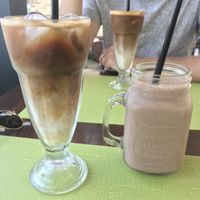 Oat mylk iced latte and three little birds smoothie with hemp protein  at Vita Health Food Bar in Hvar