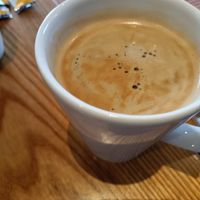 Lavazza coffee self serve (you order black coffee and use provided oat milk sachets) at The Bright Helm - JD Wetherspoon in Brighton