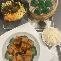 Impossible soup dumplings, general tso’s tofu, impossible Dan Dan noodles  at Wu and Nussbaum in New York City