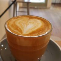 Oat milk latte at Kin Cafe Vegetarian in London