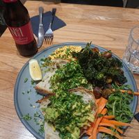 Kin Toasr with Scrambled Tofu, Kale, Avocado, and Mushrooms at Kin Cafe Vegetarian in London