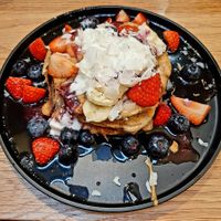 Pancakes fruits & peanut butter at Kin Cafe Vegetarian in London