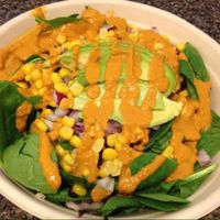 Fiesta Bowl: brown rice, black beans, corn, onions, avocado, sub'd spinach for tomatoes, red basil dressing at RAW Organic Food and Juice in Scottsdale