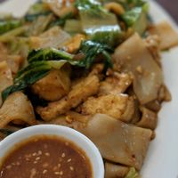 Menu Item V06 (Nyat KaukSwe Gyaw) Flat rice noodles with Vatana, crushed peanuts, romaine, and tofu. It's Delicious!  at Mandalay Restaurant and Cafe in Silver Spring