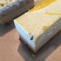 Mango cheesecake and white chocolate salted caramel cake at Raw Trader in Melbourne
