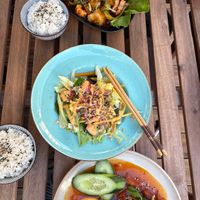 Vegan duck, green salad with mango & dumplings.  at Rau&La in Warsaw