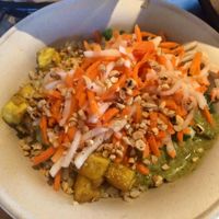 Tofu bowl with rice and green curry sauce at Zao Asian Cafe in Salt Lake City