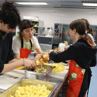 Student volunteers cooking the food at De Pit in Utrecht