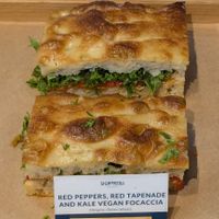 RED PEPPERS, RED TAPENADE AND KALE VEGAN FOCACCIA at Signorelli bakery - Wood Wharf in England