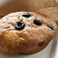 Olive ant tomato focaccia, my least favorite, lacks more tomato at MERCY Vegan Bakery in Kyoto