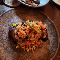 Smothered cauliflower steak with side of roasted mushrooms! at The Easterly in East End