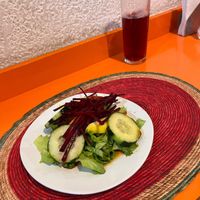 Salad with cucumber, beet, and apple. The meal includes a drink, they gave me this sweet hibiscus drink.  at Comida Vegetariana in Mexico City