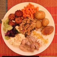 Tofu in a mustard sauce, seitan, potatoes, spicy baby carrots, rice, cabbage and rice meatballs at Jardim dos Sentidos in Lisbon
