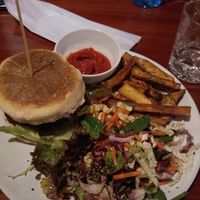 The burger with almond salad and fries  at Jardim dos Sentidos in Lisbon