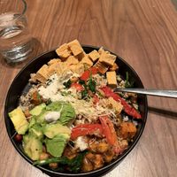 Quinoa bowl with cashew crema. Paid extra to add tofu and avocado.   at Hills Kitchen in Salt Lake City