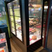 Cake display from inside at Bravo Patisserie in Brighton