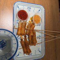 Enoki mushroom skewers with tofu skin   at SLAP Hand Ripped Noodles in Orlando