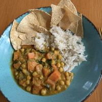 Chickpea curry with poppadom chips    at Tiffany's Restaurant in Weston-super-mare