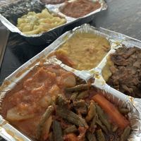 veggie sampler platter!!! two entire trays of food and plenty of injera! omnomnomnomnom!!!!  at Blue Nile Cafe in Kansas City