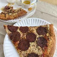 Vegan pepperoni slice (and vegan BBQ chicken in the background)  at Mikey's Late Night Slice - Dayton in Dayton