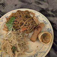 Pad thai, yellow noodles, spring roll, and fried dumpling  at My Thai Vegan Cafe in Boston