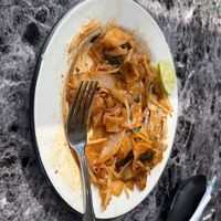 Partially eaten Pad Kee Mao  at My Thai Vegan Cafe in Boston