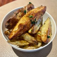 Herb roasted potatoes  at Sea Breeze Restaurant in Ras Al Khaimah