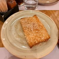 Fried Feta Cheese in Dough Pastry with Honey and Sesame (Vegetarian) at The Greco's Project  in Athens