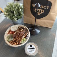 Zesty Mexican Power Bowl with Tempeh Add-on Protein and Raw Vegan Cheesecakee  at Impact Kitchen in Toronto