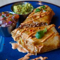 Chimichanga: filled with rice, chorixo, grilled veg, fried potato and tomatillo salsa verde - vegan, nut free   at Antojitos Cantina in Edinburgh