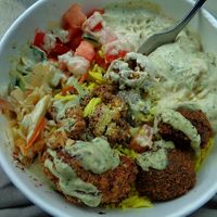 Vegan Feast bowl with herb tahini sauce moved to side. They were out of eggplant that day which would have been on it. at Bezoria - N Olmsted in North Olmsted