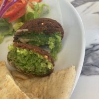 Ful Medames with pita bread and side salad included. Felafel ball was extra.  at Hummus Cafe in Seattle