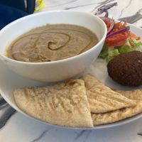 Ful Medames with pita bread and side salad included. Felafel ball was extra.  at Hummus Cafe in Seattle
