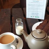 Tea with soya milk and vegan chocolate cake at Waterside Cafe in Kendal