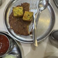 Kothimbir Wadi on top and Thalipeeth   at Mi Marathi in Mumbai