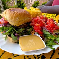 Garvey Burger platter. Tasty salad dressing. at Soul Vegetarian Kitisuru Branch  in Nairobi