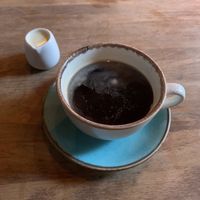 Coffee w/ oat milkk  at Arts Picturehouse Cafe in Cambridge