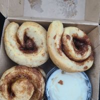 baby buns with a side of cream cheese frosting at Cinnaholic - South Euclid in South Euclid