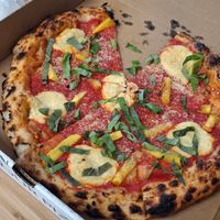
VEGAN MARGHERITA - 
red sauce, cashew mozzarella, olive oil, vegan parmesan, fresh basil + added pineapple
 at Wild Flour Pizza Co in Abbotsford