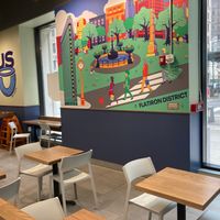 Seating inside at Just Salad Midtown South in New York City