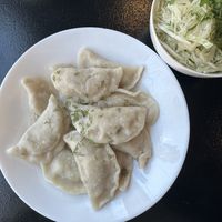 Varenyky (Pierogi) with Potatoes and Onions, and Shredded Cabbage Salad  at Borscht Kitchen in Toronto