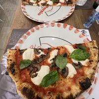 The pies are quite large (and delicious).  If you’re not too hungry, you can share a pie and they serve it like this 🙂   This was our late evening snack, so we shared a pie. at Al Solito Porzio | Pizzeria Palermo in Palermo