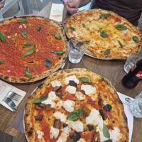 Pizza Siciliana and marinara. at Al Solito Porzio | Pizzeria Palermo in Palermo
