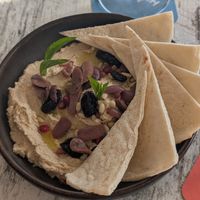 pita and hommus with toppings at Cable Beach House in Broome