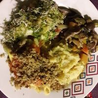 El plato fuerte compuesto por pure de papa, ensalada fresca con germinados, champiñones y una pasta con salsa casera napolitana y quinoa  at Espiritu Libre in Medellin