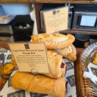 Vegan beetroot and apple sausage rolls and vegan bean chilli pasties in the back at The Mall Deli in Bristol