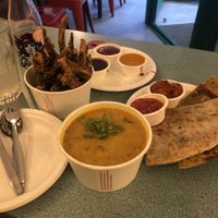 Taarka daal & rice, okra fries& 3 sauces & Paratha & Thepla. Everything delicious!   at Bundobust in Leeds