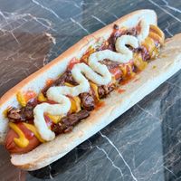 Cheesy bacon hotdog  at Vegan Burger - JBR in Dubai